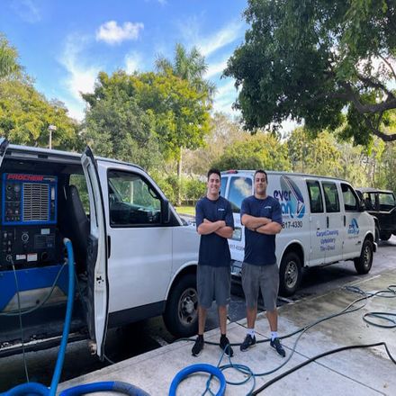 The Everclean Steam Services team with their service vans