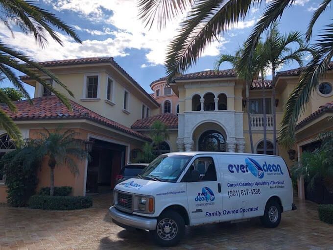 Everclean Steam Services branded van at a South Florida home